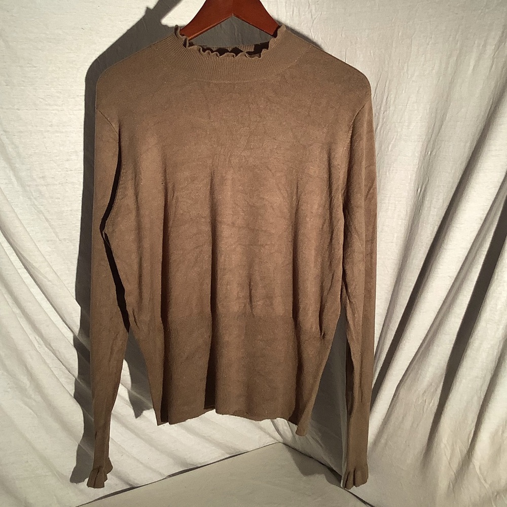 Terry Lewis, ruffled, mock turtleneck